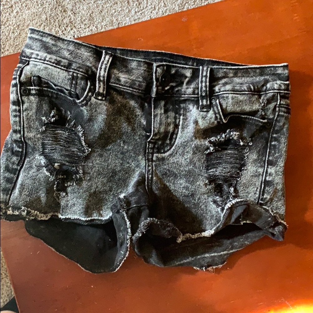 Low rise distressed jean shorts